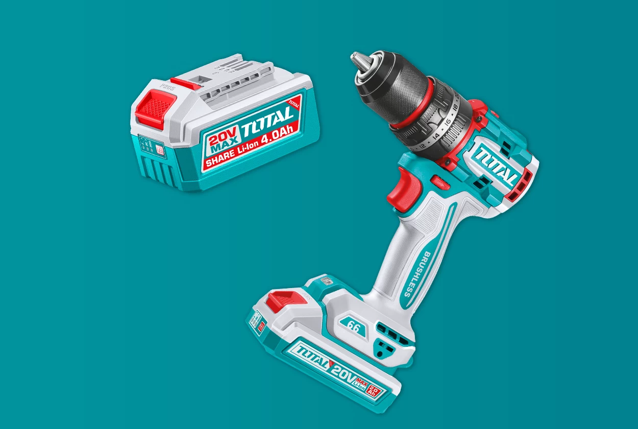TOTAL brushless cordless drill with its fitted battery and an additional battery alongside it